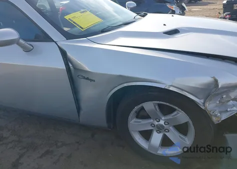 2012 Dodge Challenger Sxt z USA, uszkodzony, nr VIN 2C3CDYAG5CH181323